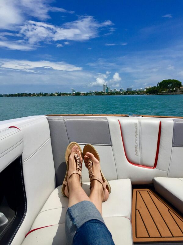 woman on boat relaxing