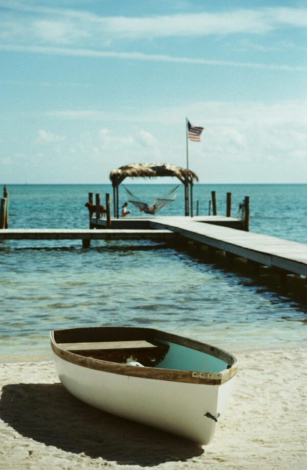 boat anchored on shoreline