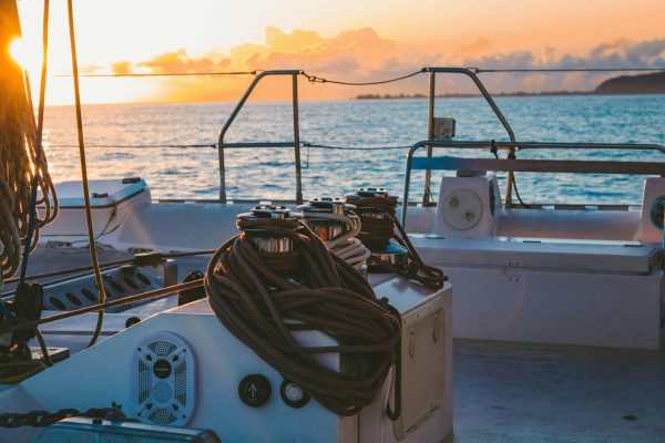 sailboat rigging and sunset background